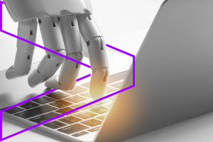 Robotik-Hand tippt auf Laptop-Tastatur